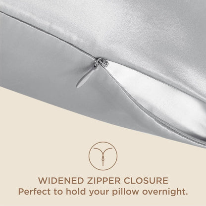 Silver pillow with widened zipper closure on a beige background