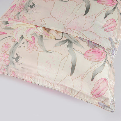 Floral fabric with pink tulips and gray leaves on a light background