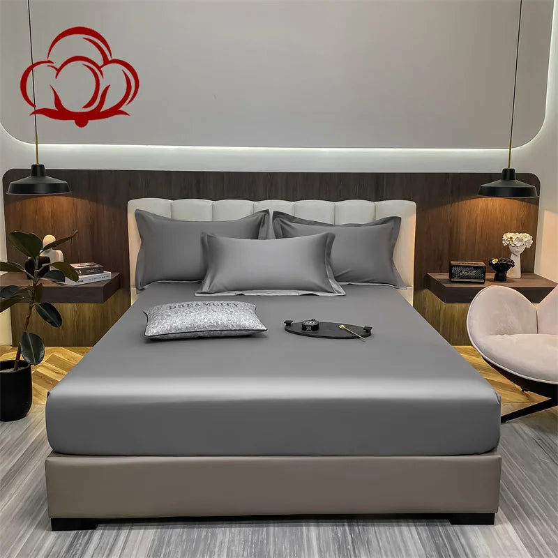 Modern bedroom with a bed, nightstands, and decorative items.