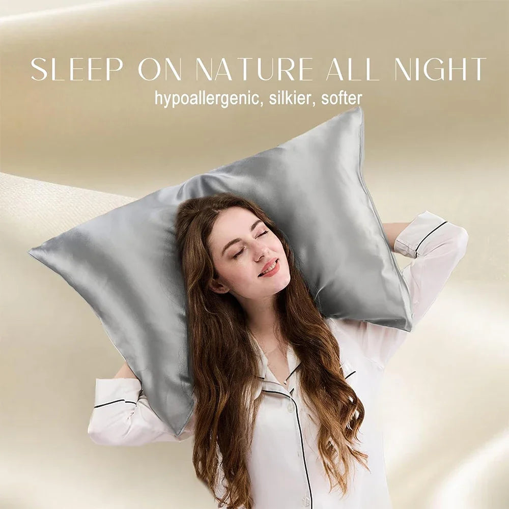 Woman lying on a bed with a gray satin pillow, surrounded by text promoting comfort and hypoallergenic properties.