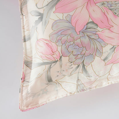 Floral patterned fabric with pink and purple flowers on a light background