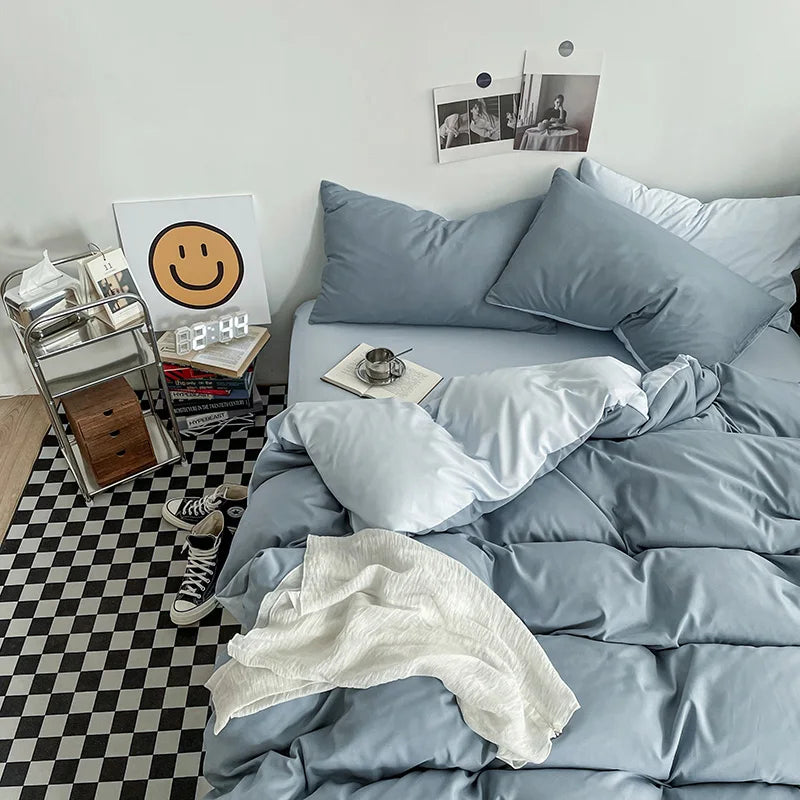 Bedroom with light blue bedding and a checkered floor.